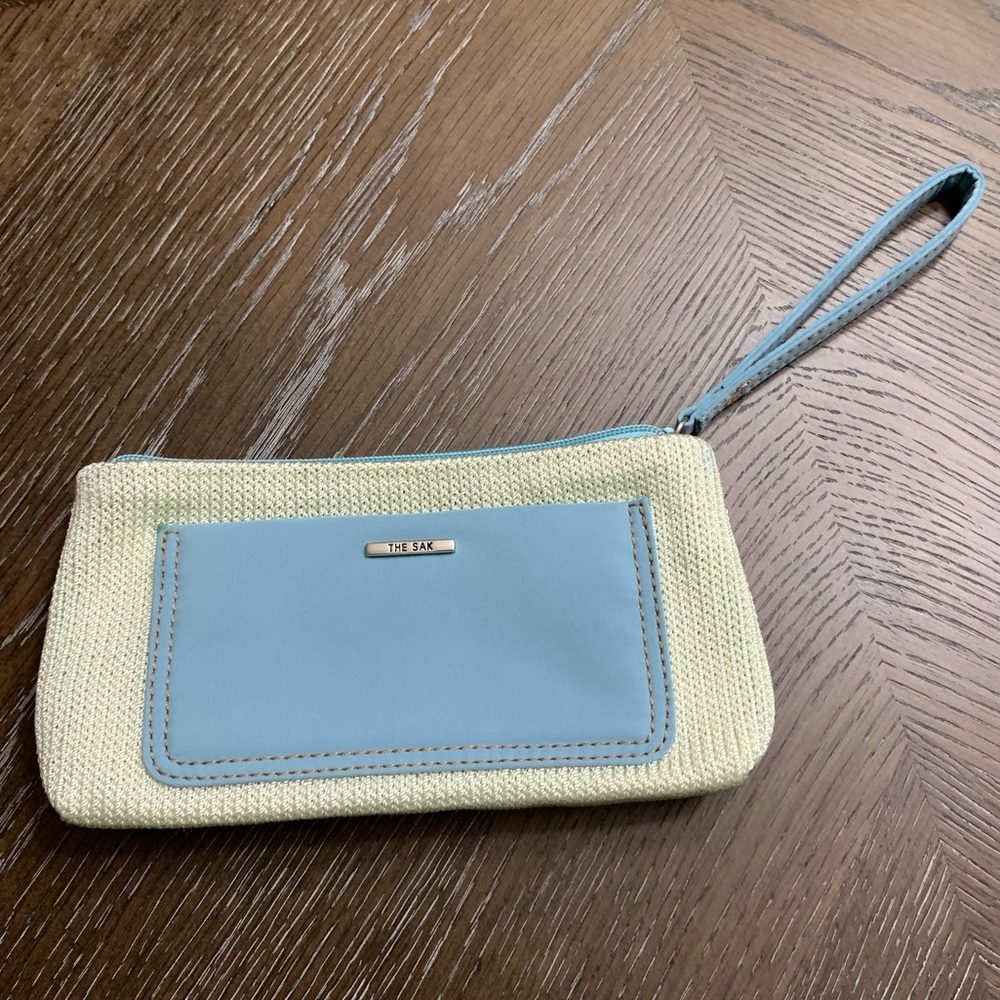 The Sak arctic blue with cream crochet wristlet bag
